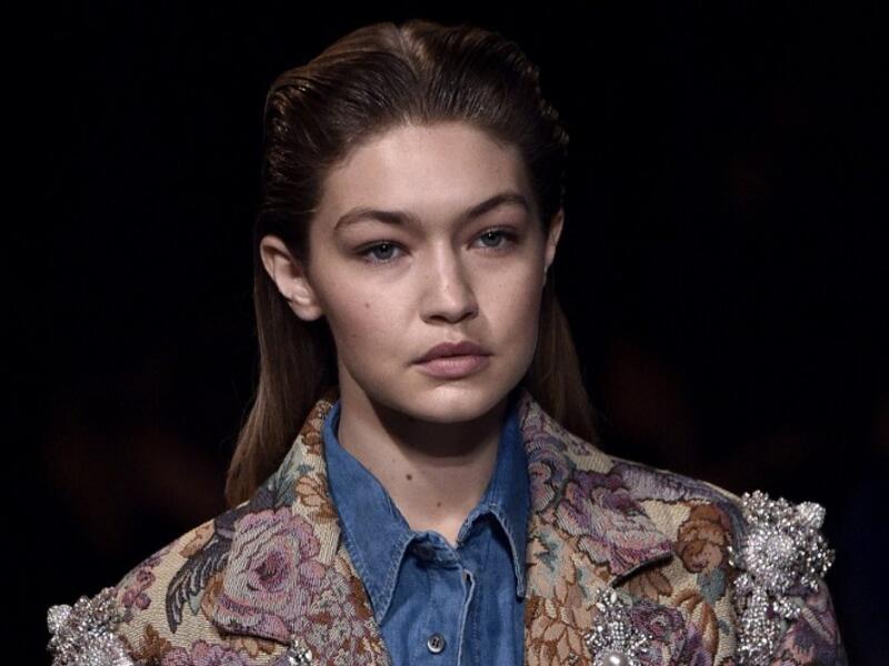 Bare-faced but ornately adorned Gigi Hadid. (AFP/Martin Bureau)