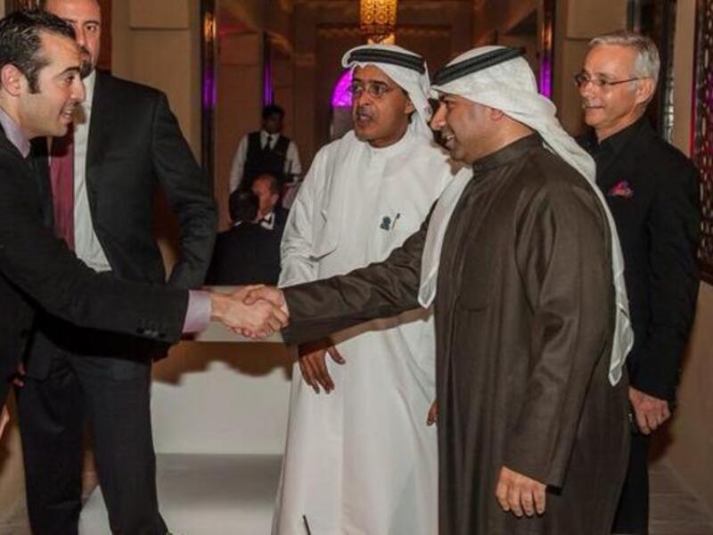 Mohammad al-Turki shaking hands at DIFF (Image: Twitter)
