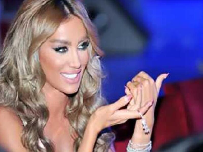 No shrinking violet, Maya Diab is hostile to the subject of divorce rumors 