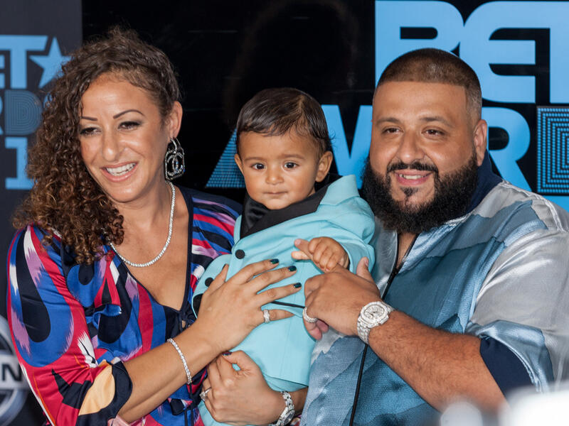 DJ Khaled, Nicole Stock, and their son. (Jamie Lamor Thompson / Shutterstock.com)