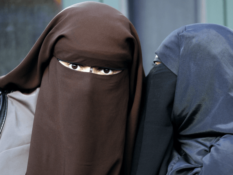 The statements come after Muslim wife of a convicted terrorist, Moutia Elzahed, was charged for refusing to stand before a court (AFP/File)