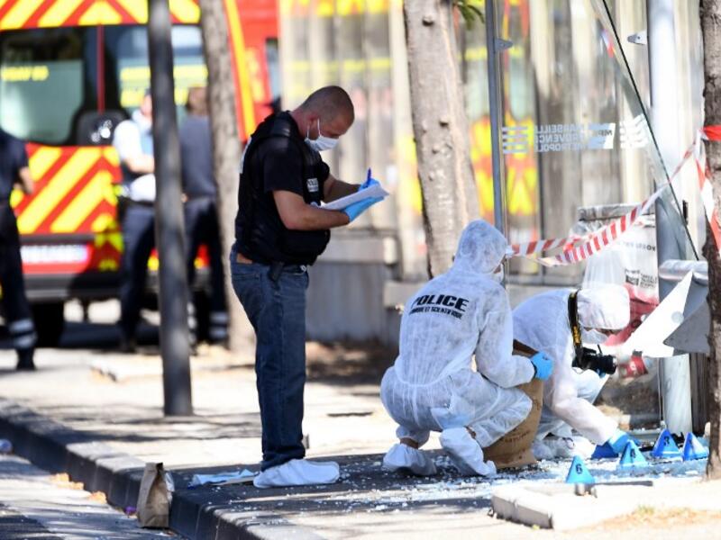 French forensic police search the site following a car crash on August 21, 2017, in the southern Mediterranean city of Marseille (AFP)