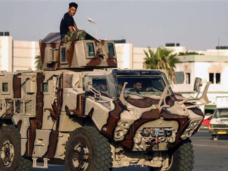 Consolidating Power:

Haftar began consolidating his power and established the new Libyan National Army, loyal to the Tobruk-based government. Opposing militias grouped together to become a collective known  as Libya Dawn, which has been described as the army of the Tripoli-based government.

(Photo: LNA forces. AFP) 