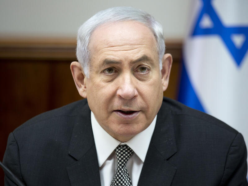 
Israeli police questioned Yedioth Ahronoth publisher Arnon Mozes in January as part of a probe into allegations against Netanyahu. (AFP) 