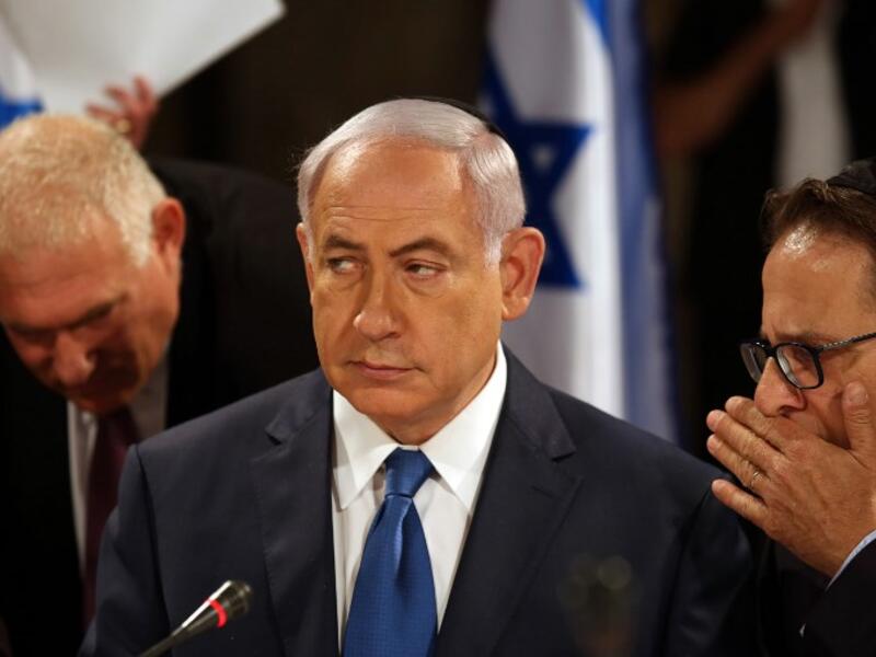 Israeli Prime Minister Benjamin Netanyahu gestures during a special cabinet meeting, held in the Western Wall tunnels in Jerusalem's Old City on May 28, 2017. (AFP/Gali Tibbon)