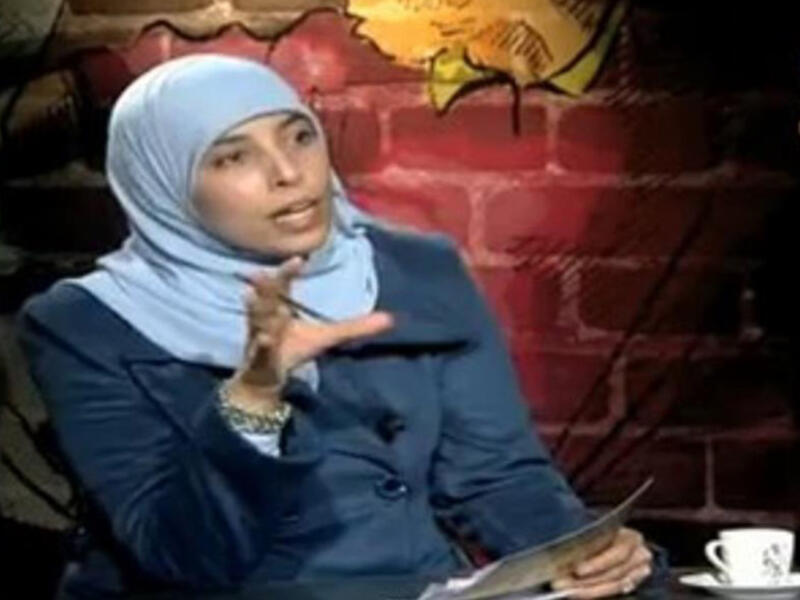 Jordanian Ahlam al-Tamimi hosting a talk show interviewing a Hamas member. (File photo)