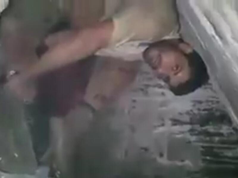 Suleiman al Huti's last moments were captured on film by the militants who killed him (screenshot)