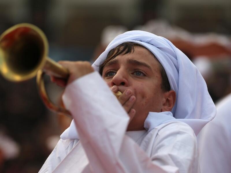 Shiite pilgrims take part in the preparations of the Ashura ceremony in Karbala, about 80 kilometres (50 miles) southwest of Baghdad on September 18, 2018. AHMAD AL-RUBAYE / AFP