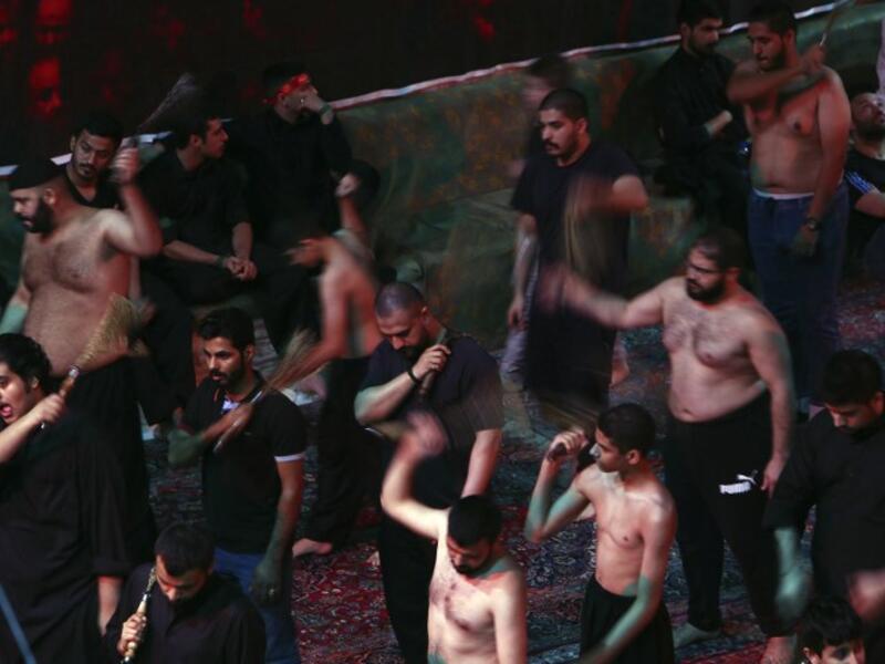Kuwaiti Shiite Muslims take part in a traditional mourning event during the ten-day mourning period leading up to Ashura, on September 19, 2018 in Kuwait City. Yasser Al-Zayyat / AFP