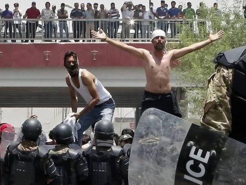 An image shared by social media users for confrontations in Basra city between protesters and police. (Twitter)