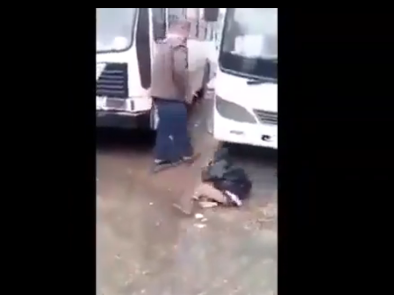 An Algerian man appears in a video while abusing an African migrant child in Annaba, Algeria. (Screenshot/Youtube)