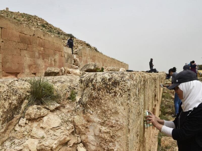 Experts and students from Algiers University’s Archaeology Institute work on one of the Jeddars pyramid tombs.
RYAD KRAMDI / AFP