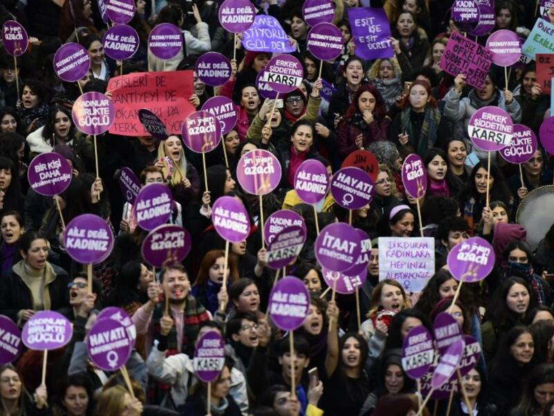 Women's rights activists gather to march through Taksim Square to protest against gender violence in Istanbul, on November 25, 2018, on the International Day for the Elimination of Violence against Women. 
Yasin AKGUL / AFP