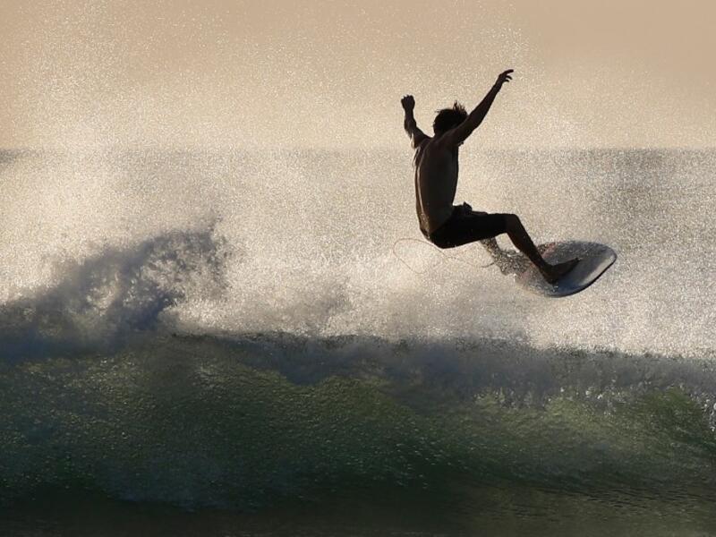 A surfer enjoys the waves at Las Baulas National Marine Park, Playa Grande, Costa Rica on December 10, 2018. David GANNON / AFP