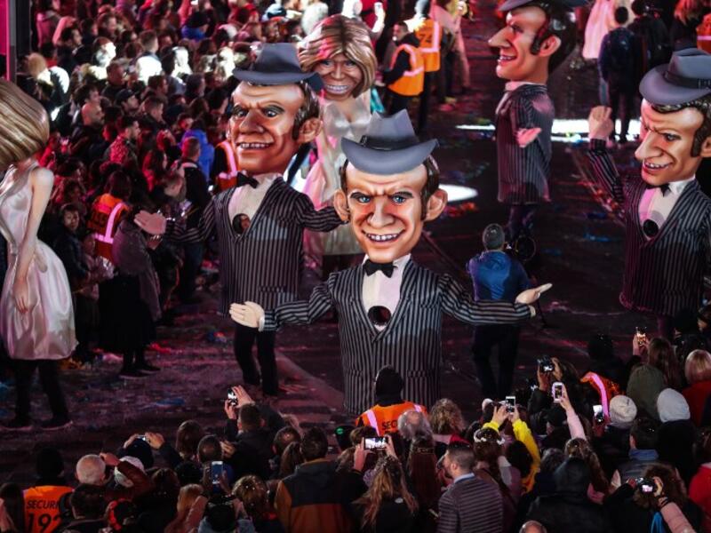 Statues of French President Emmanuel Macron and his wife Brigitte parade on the first day of the 135th Nice Carnival which runs until March 2 with the theme "King of Cinema," on February 16, 2019 in Nice, French Riviera.
VALERY HACHE / AFP