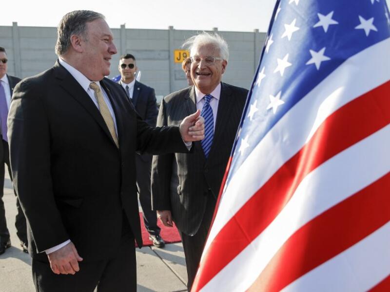 US Secretary of State Mike Pompeo (L) meets with US ambassador to Israel David Friedman (C) upon his arrival at Ben Gurion International Airport, near the Israeli city of Tel Aviv on March 20, 2019.
JIM YOUNG / POOL / AFP