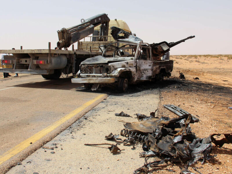 The remains of a car from a suicide bombing in the Libyan city of Misrata. (AFP/File)