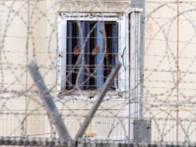 A glimpse past the fence of Nafha prison. (AFP/File)