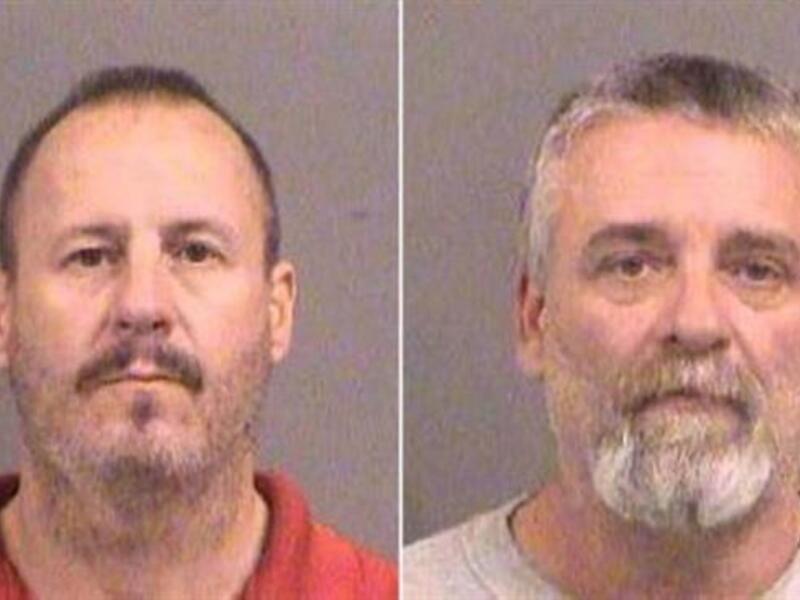 This photo released by police shows Curtis Allen (L) and Gavin Wright who are reported to be part of a militia group called the Crusaders, which first drew the FBI's attention last February.