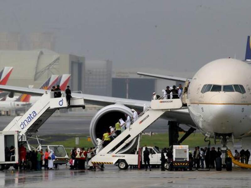 Television footage had shown the plane, reportedly carrying around 300 people, surrounded by dozens of security vehicles and officers armed with high-powered firearms at an isolated area of the runway at Manila's airport. (AFP/File)