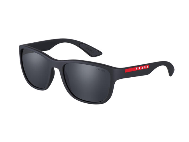 Linear aesthetics and an ‘active’ attitude are the key themes of the second sunglasses of the new Prada Linea Rossa Flask collection. The squared wraparound front is combined with thick temples, highlighted by the iconic red stripe logo.The rubber coating comes in an array of colors: Black, Grey, Dark Chocolate,White, and Amaranth. 