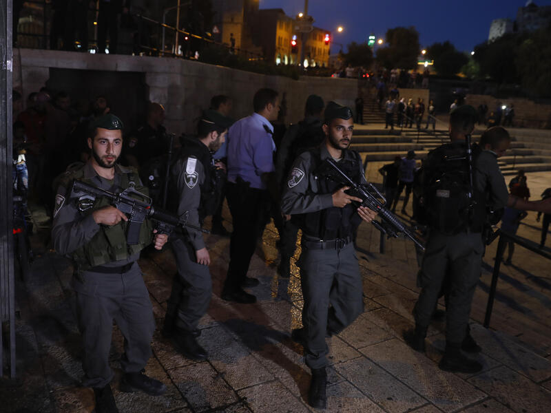 Israeli border police patrol the area where Fatima Afif Abd al-Rahman Hjeiji was killed on May 7. (AFP/Menahem Kahana)