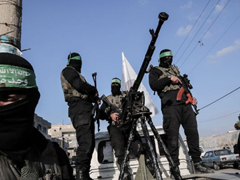 Members of the Ezzedine al-Qassam Brigades, the military wing of the Palestinian Islamist movement Hamas, take part in a rally marking the 29th anniversary of the creation of the movement on December 16, 2016 (AFP Photo/Said Khatib)