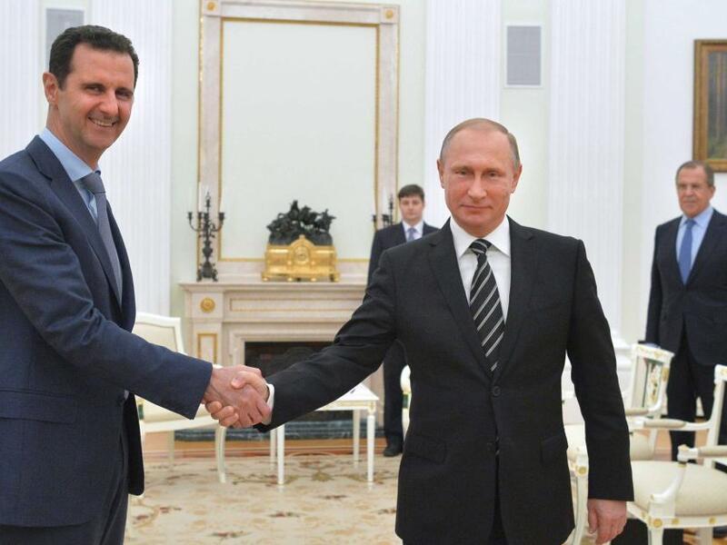 Assad and Putin have close ties, and aerial bombings by both parties have been responsible for the deaths of thousands of civilians (AFP /File)