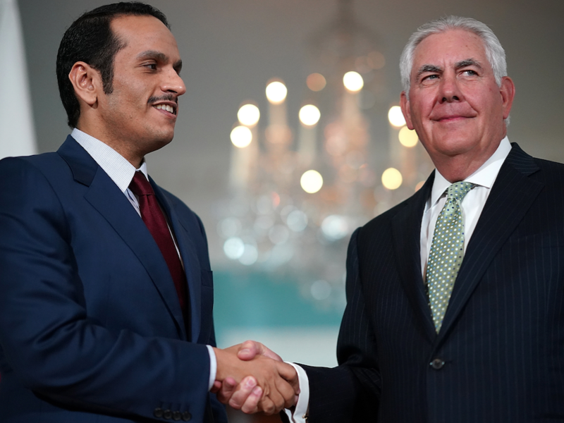 U.S. Secretary of State Rex Tillerson shakes hands with Qatari Foreign Minister Sheikh Mohammed Bin Abdulrahman Al Thani prior to a scheduled meeting at the State Department | AFP