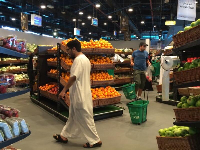 Shoppers look to fill their "Qatari stomachs" in a Doha supermarket (file photo)