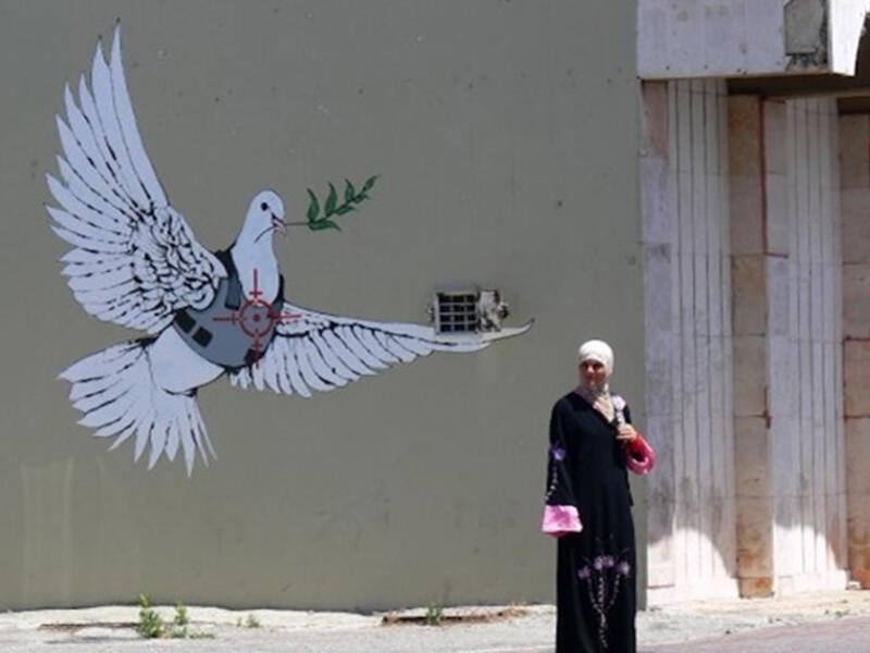 “The greatest crimes in the world are not committed by people breaking the rules but by people following the rules. It’s people who follow orders that drop bombs and massacre villages.” Another classic quote from the street artist.