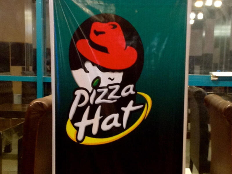 counterfeit food franchise pizza hat Iran