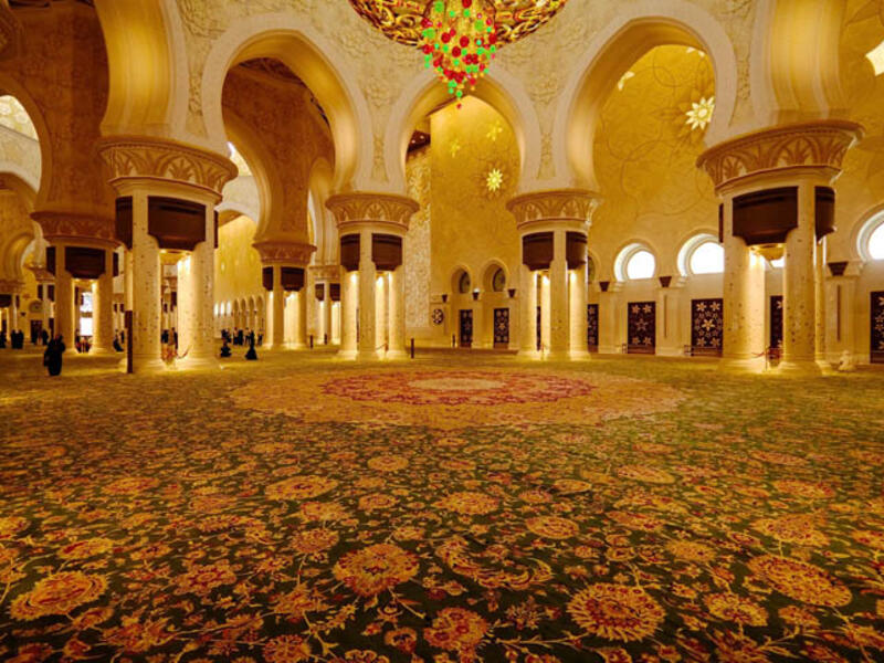 Biggest mosque carpet - The longest red carpet might be in Hollywood, but the largest mosque carpet is in the Sheikh Zayed Grand Mosque in Abu Dhabi. The UAE snatched the title from Oman in 2007 when they unrolled their 53 square foot masterpiece. This mosque also boasts the biggest chandelier and the largest dome of its kind in the world.