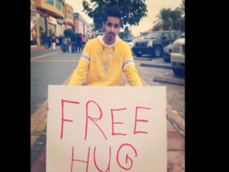 A snapshot of the "Free Hugs" campaign taking over the Riyadh streets. (Via YouTube)