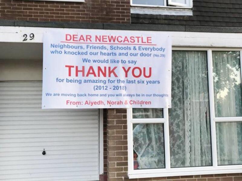 A banner hangs outside the house of Aiyedh Al-Shahrani. (Twitter)