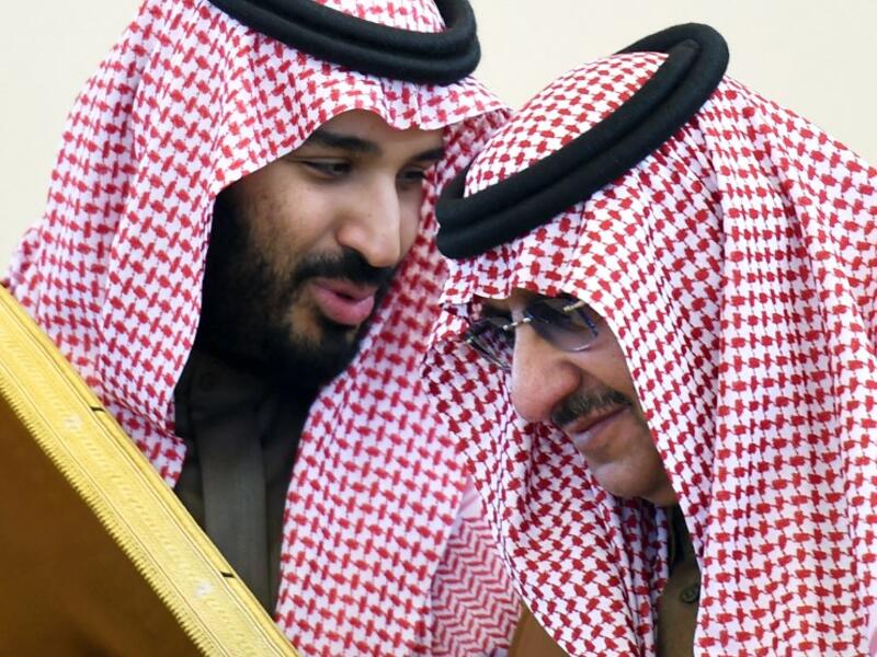 This photo taken on December 9, 2015 shows Saudi Defence Minister Mohamed bin Salman (L) talking with Crown Prince and Interior Minister Mohammed bin Nayef during the 136th Gulf Cooperation Council (GCC) summit in Riyadh. (Fayez Nureldine/AFP)