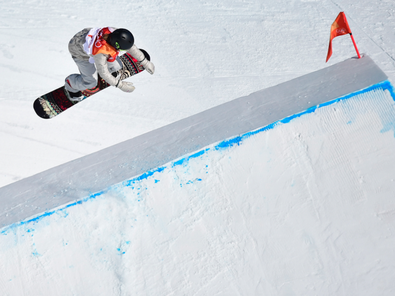 U.S. Jamie Anderson competes and wins in a run of the women's snowboard slopestyle final event at the Phoenix Park during the Pyeongchang 2018 Winter Olympic Games on February 12, 2018 in Pyeongchang. 
(Martin BUREAU / AFP)
