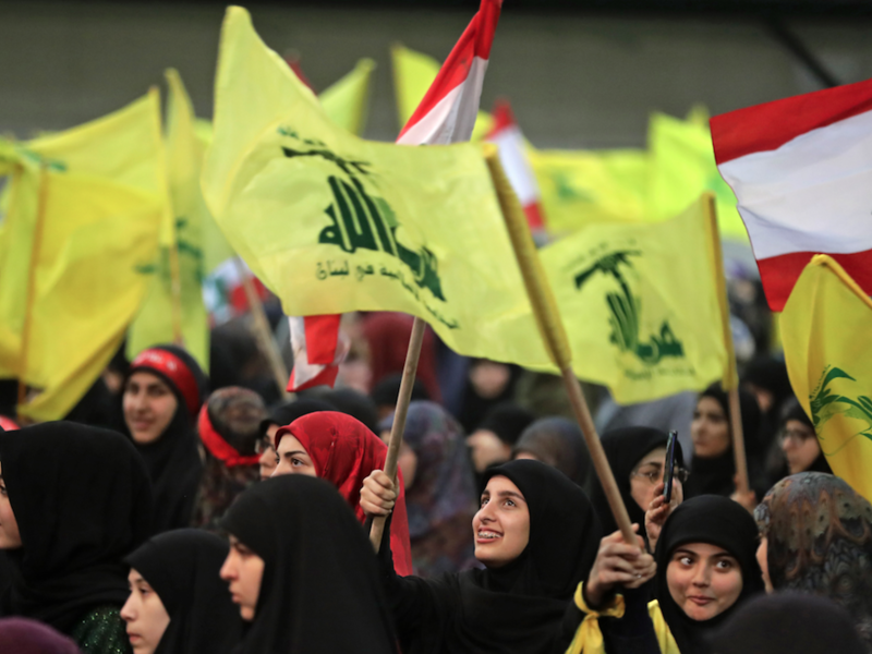 Supporters of Lebanese Hezbollah Leader gather as he delivers a televised speech during a ceremony held by the Shiite party in the capital Beirut, commemorating the party's killed leaders, on February 16, 2018. 
(JOSEPH EID / AFP)