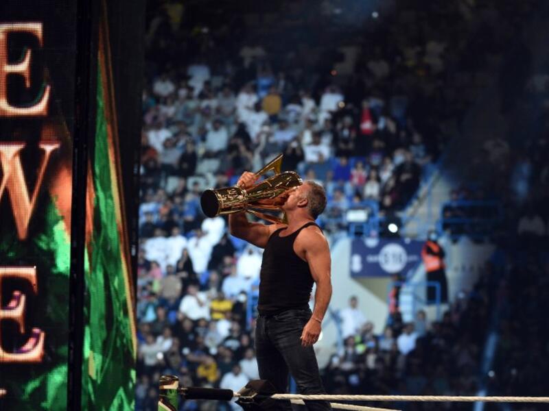 Shane McMahon, SmackDown commissioner and minority owner of WWE, raises the WWE World Cup trophy following the match as part of as part of the World Wrestling Entertainment (WWE) Crown Jewel pay-per-view at the King Saud University Stadium in Riyadh on November 2, 2018.
Fayez Nureldine / AFP