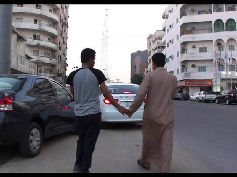 arabs holding hands