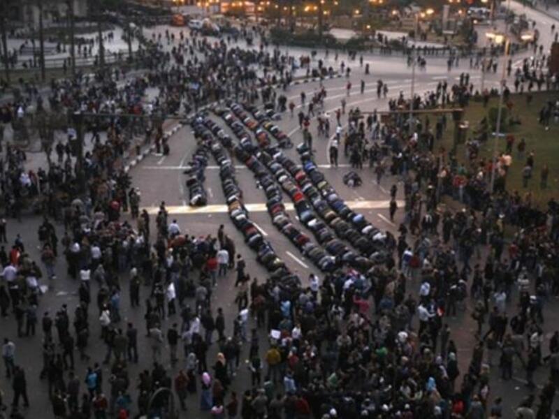 Egyptian demonstrators pray in central Cairo during the demonstration.