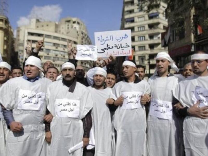 This is my shroud for Egypt: We are here til the finish, and will rise and fall with Egypt.