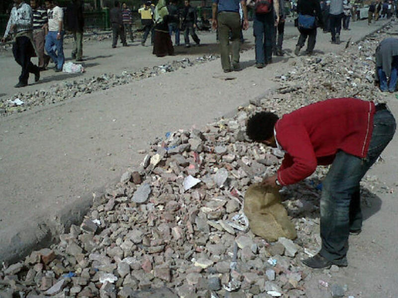 Egyptian protesters ensure a Clean Revolution as they responsibly make efforts to keep the public space clear and in order.