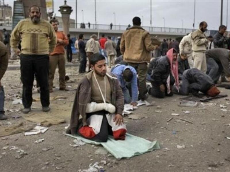 Broken arm, but the faith and endurance do not seem to waver.