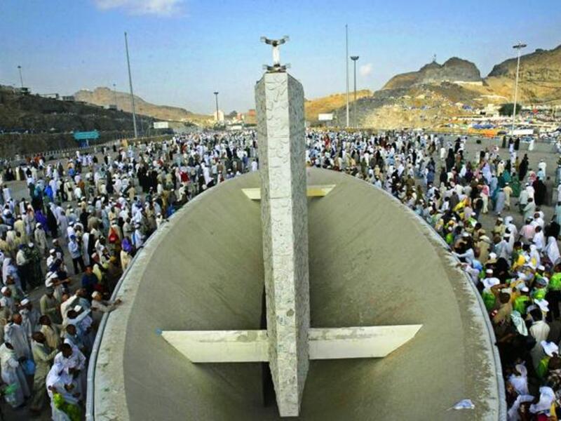 Taawaf-e-Afaza: First , another, or additional, circuit of the Ka’ba, then it's back to Mina for 3 or 4 days, 
stoning the pillars each day. Pilgrims by now can in theory step out of their pilgrim attire and 'state' of Ihram.