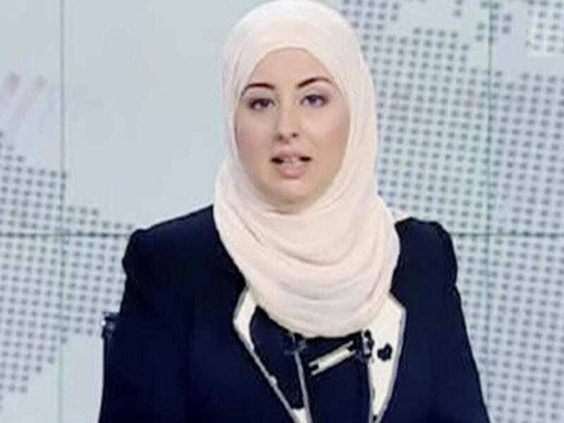 Egypt's first veiled news anchor