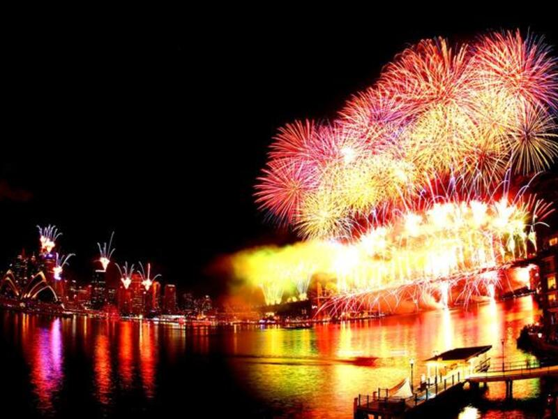 Fireworks light up the skyline over Sydney Harbour during the midnight fireworks session as Sydney Celebrates New Year's Eve with the theme of ' A Time To Dream' in Sydney, Australia.