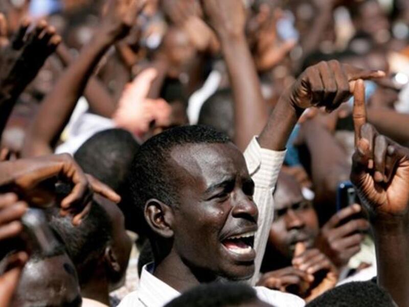 A Sudanese student shouts slogans during a protest against the visit of Darfur mediators from Qatar and the UN outside the University of Zalingei.