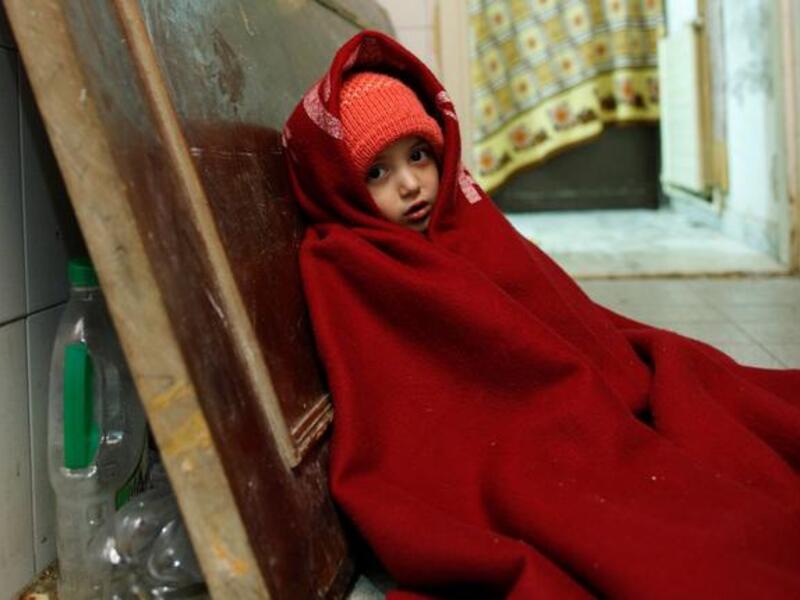 Syrian girl sits in an Amann apartment (Photo UNHCR/ B. Sokol)