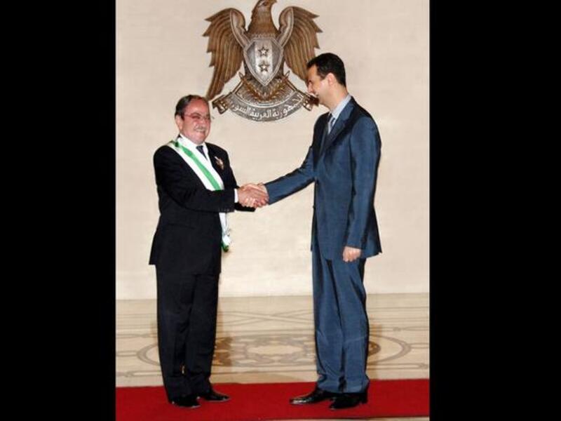 Durid Laham: a Face Book page described him as "horn of the regime". He used to act in theater plays that were critical of the regime; while now he supports Al-Assad. Some suspect he doesn't know which side his bread is buttered- that Laham demands reform and supports the regime at the same time.
